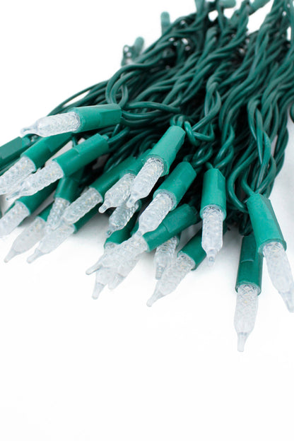 Perfect Holiday 70 LED Indoor/Outdoor Crosshatch Pointed Tip Green Cable Christmas String Lights - Warm White